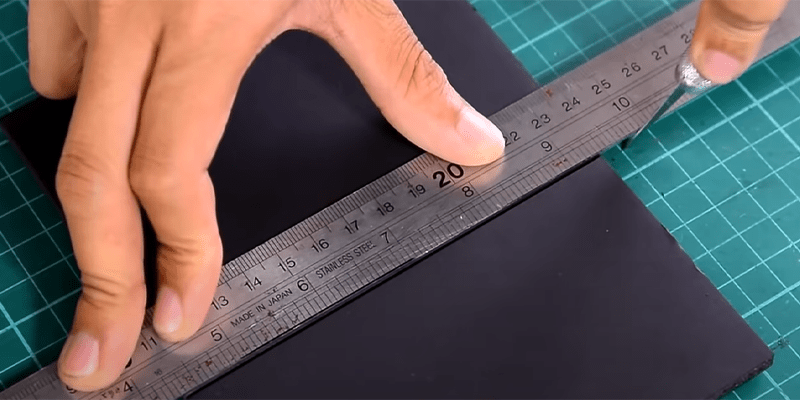 Cut a piece of foam core for DIY smartphone projector